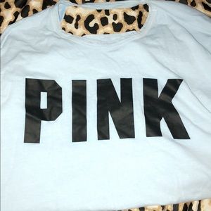 Pink light blue shirt.